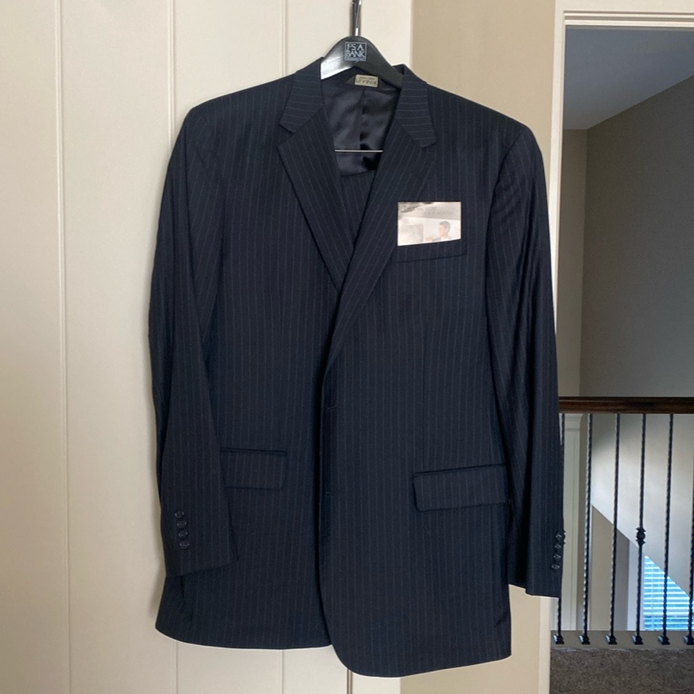 Brand new never worn JoS A Bank navy blue pinstripe suit